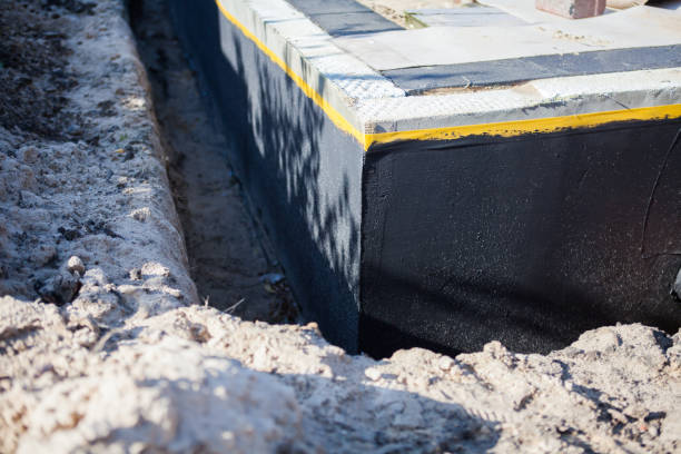 Professional Exterior Waterproofing technician working in Warrenton, OR